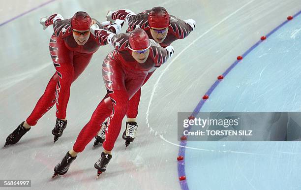 Team Canada competes during the women's Team Pursuit speed skating final at the 2006 Winter Olympics 16 February 2006, in the Lingotto Oval, Turin....