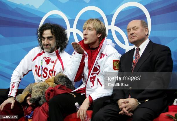 Evgeni Plushenko, center, of Russia blowes kisses to the camera after his performance in the Men's Free Skate Program Final during Day 6 of the Turin...