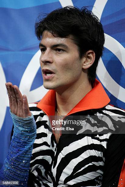 Stephane Lambiel of Switzerland blows kisses to the crowd after competing in the Men's Free Skate Program Final during Day 6 of the Turin 2006 Winter...