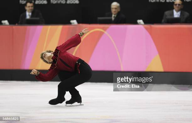 Judges watch Jeffrey Buttle of Canada compete in the Men's Free Skate Program Final during Day 6 of the Turin 2006 Winter Olympic Games on February...