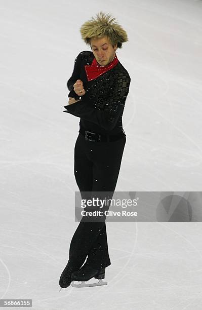 Evgeni Plushenko of Russia waves to the crowd after his performance in the Men's Free Skate Program Final during Day 6 of the Turin 2006 Winter...