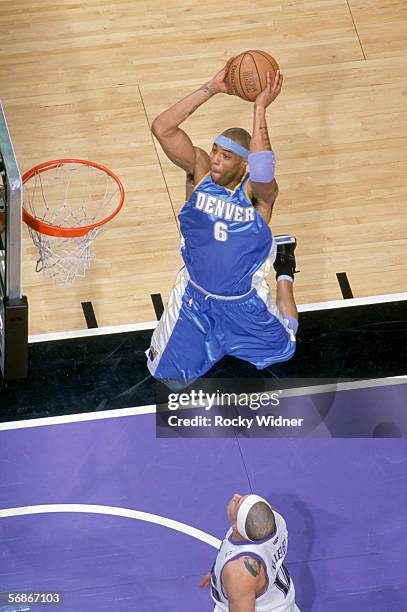 Kenyon Martin of the Denver Nuggets shoots against the Sacramento Kings during the game at the ARCO Arena in Sacramento, California, on January 31,...