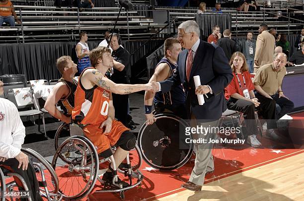 David Stern, commissioner of the NBA, greets NWBA All-Stars during the NWBA All-Star Wheelchair Classic at NBA Jam Session presented by Nokia on...