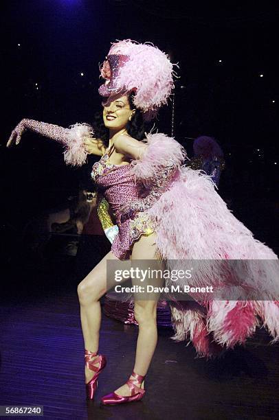 Dita Von Teese performs on stage at the magazine launch party thrown by editor Lucy Yeomans for British Harper's Bazaar at Club Cirque on February...