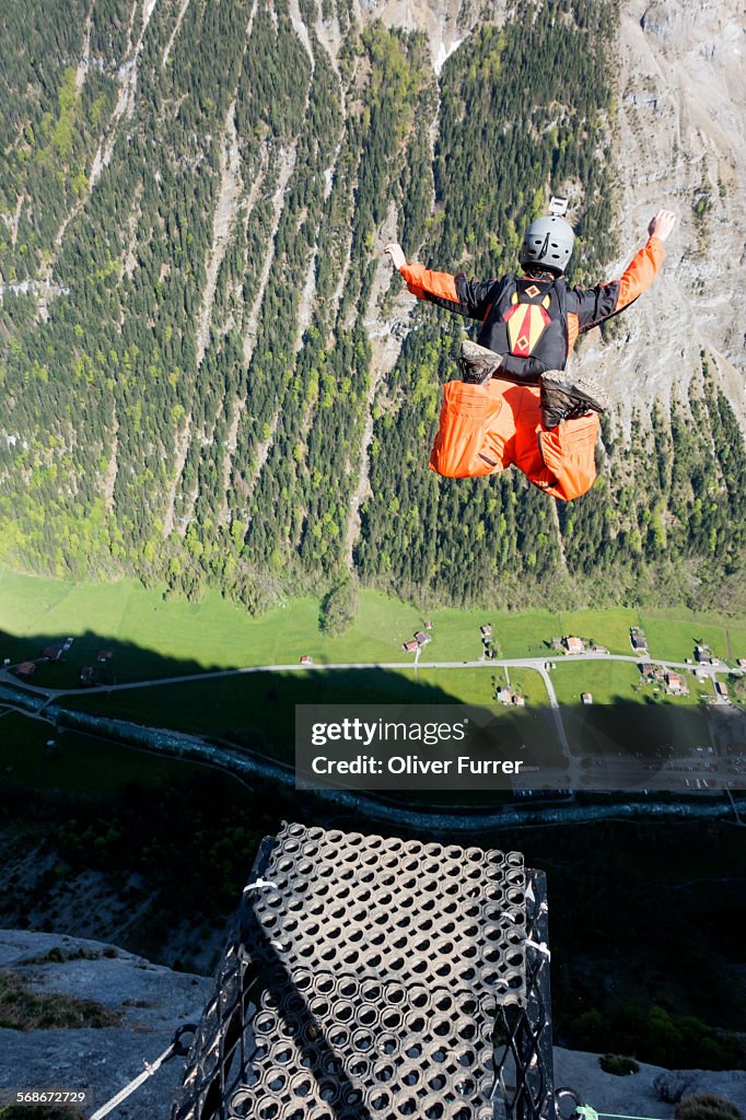 BASE jumper got of a ramp and is falling down