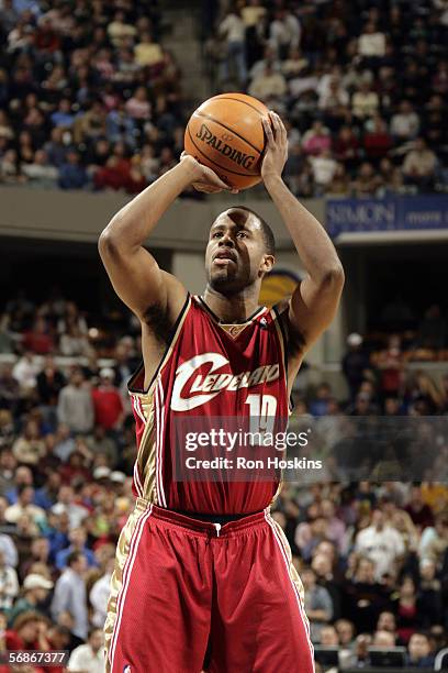 Damon Jones and Eric Snow of the Cleveland Cavaliers prepares to shoot a free throw during a game against the Indiana Pacers at Conseco Fieldhouse on...