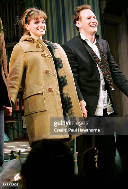 Actors Amanda Peet and Patrick Wilson take the stage during the curtain call on opening night of "Barefoot in the Park" at the Cort Theatre February...