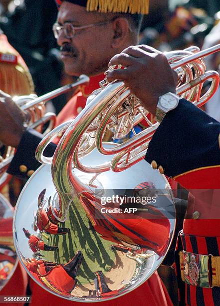 Members of an Indian state music band perform at the Sate Police Academy in Hyderabad, central India, 17 February 2006, during an all India police...