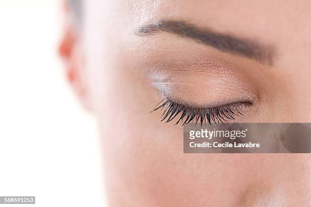 close-up of woman's closed eyes - eyelid foto e immagini stock