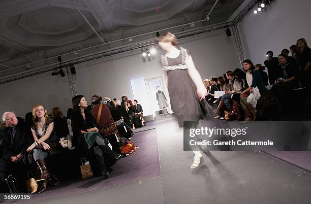 Models walk down the runway during the Jessica Ogden fashion show as part of London Fashion week Autumn/Winter 2006/7 at the Royal Academy of the...