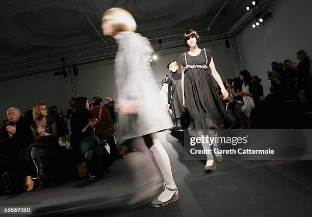 Models walk down the runway during the Jessica Ogden fashion show as part of London Fashion week Autumn/Winter 2006/7 at the Royal Academy of the...