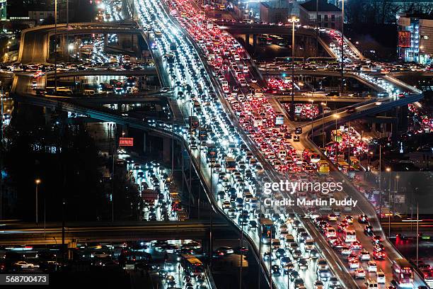 beijing,road intersection,busy with traffiat night - demographic overview stockfoto's en -beelden