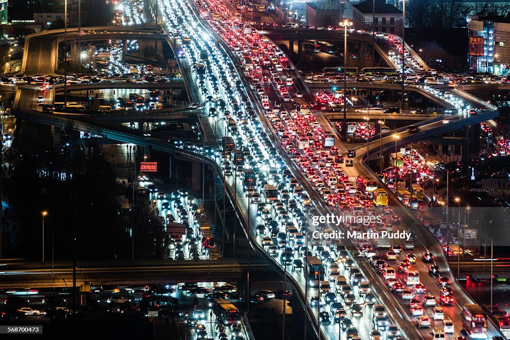 Beijing,road intersection,busy with traffiat night