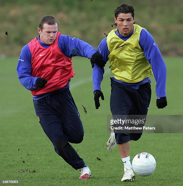 Cristiano Ronaldo and Wayne Rooney of Manchester United in action on the ball during a first team training session at Carrington Training Ground on...