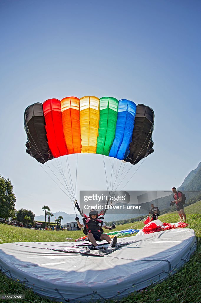 Skydiver landed with the parachute on the target