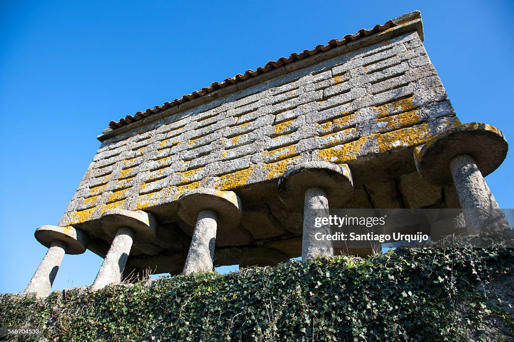 Granite granary on stone pillars