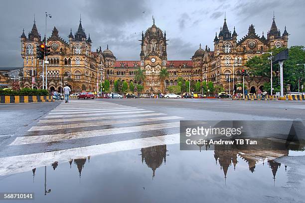 chhatrapati shivaji terminus - mumbai rain stock pictures, royalty-free photos & images