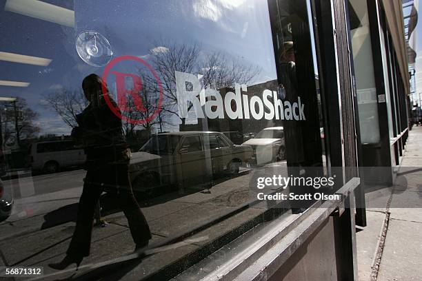 Pedestrian passes by the front of a RadioShack store February 17, 2006 in Chicago, Illinois. The retail chain recently announced that it would close...