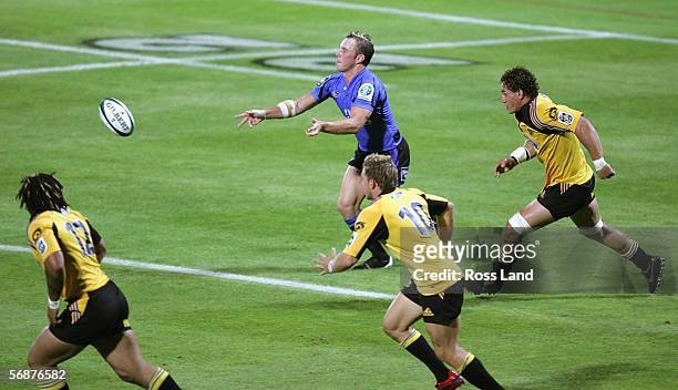 Matt Henjak of the Western Force passes the ball during the Round 2 Super 14 rugby match between the Hurricanes and the Western Force played at...