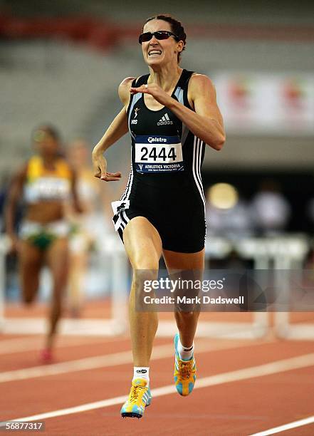 Jana Pittman on her way to winning the Womens 400 Metre Hurdles during the Athletics Australia Invitational and Victorian Athletic Championships Day...