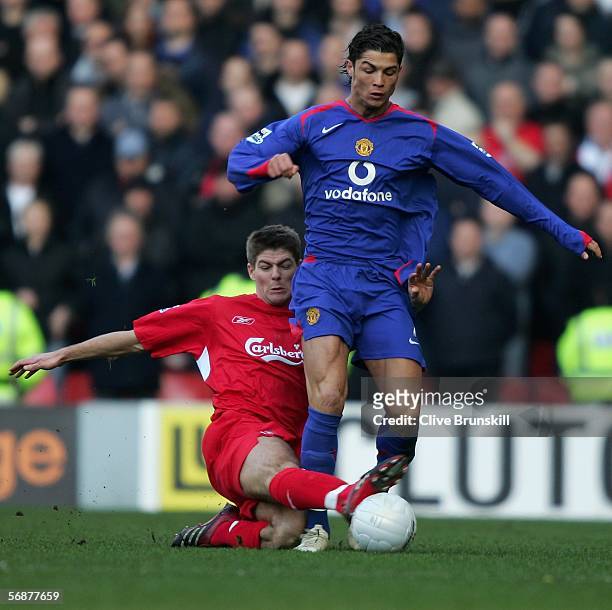 Steven Gerrard of Liverpool tackles Cristiano Ronaldo of Manchester United during the FA Cup fifth round match between Liverpool and Manchester...
