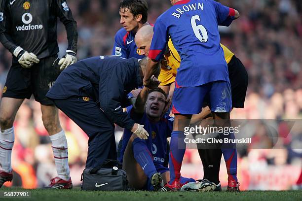 Alan Smith of Manchester United receives attention after breaking his leg during the FA Cup fifth round match between Liverpool and Manchester United...