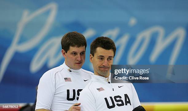 Pete Fenson of USA and John Shuster of USA look on in the preliminary round of the men's curling between USA and Germany during Day 8 of the Turin...