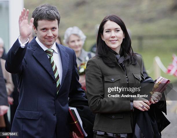 Denmark's Crown Prince Frederik and his wife Crown Princess Mary wave as they leave the museum of the former border 'Waldemarsmauer' between Denmark...