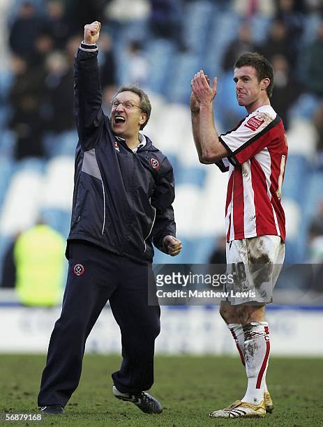 Neil Warnock, manager of Sheffield United celebrates his teams win with Michael Tonge during the Coca-Cola Championship match between Sheffield...