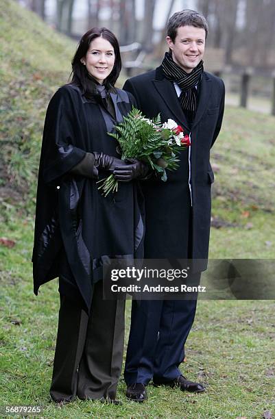 Denmark's Crown Prince Frederik and his wife Crown Princess Mary look on during their visit at the former border 'Waldemarsmauer' between Denmark and...