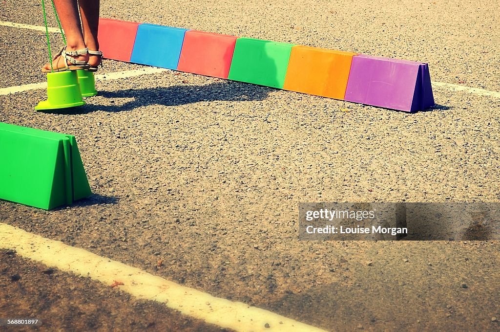Child walking on stilts
