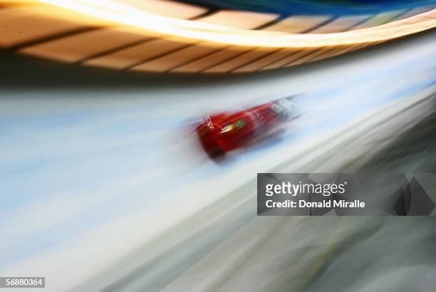 Nicolae Istrate and Adrian Duminicel of Romania compete in the Two Man Bobsleigh event on Day 8 of the 2006 Turin Winter Olympic Games on February...