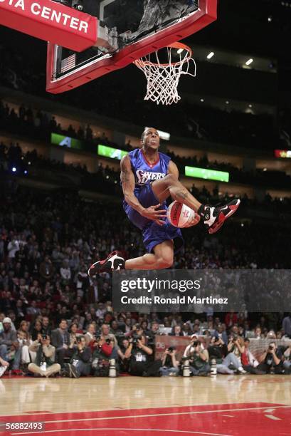 Andre Iguodala of the Philadelphia 76ers moves the ball between his legs in the Sprite Rising Stars Slam Dunk competition during NBA All-Star Weekend...