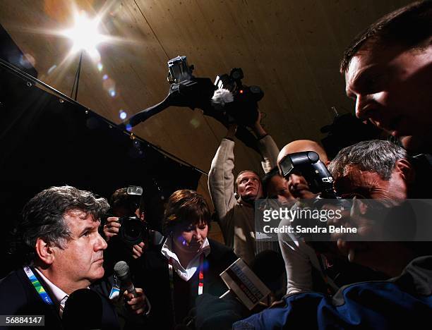 Dr. Heinz Jungwirth, General Secretary of the Austrian National Olympic Committee, speaks to the press at the Austrian House on Day 9 of the 2006...