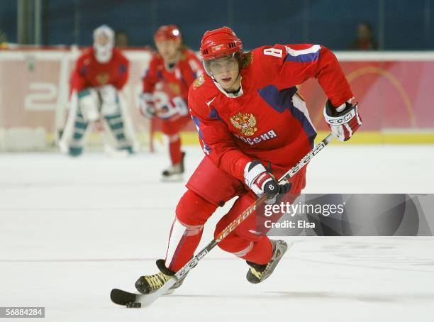 Alexander Ovechkin of Russia controls the puck during the men's ice hockey Preliminary Round Group B match between Russia and Latvia during Day 9 of...