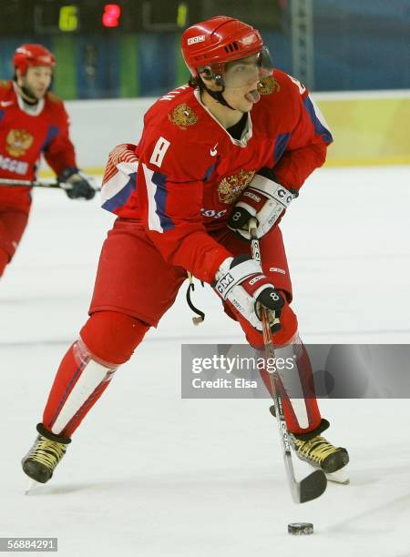 Alexander Ovechkin of Russia controls the puck during the men's ice hockey Preliminary Round Group B match between Russia and Latvia during Day 9 of...