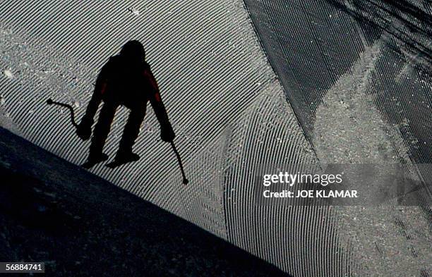 Canada's Brigitte Acton speeds down the course during the Women's Combined Downhill in San Sicario, Italy, at the Turin 2006 Winter Olympic Games, 18...