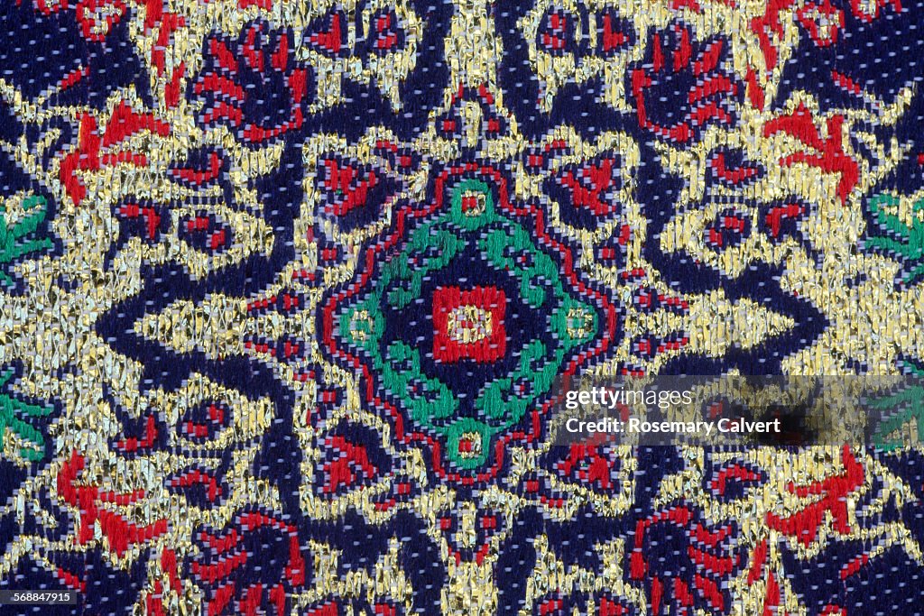 Pattern on woven Turkish fabric close up