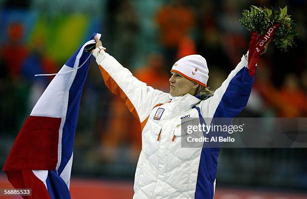 Marianne Timmer of the Netherlands celebrates winning the Gold Medal in the women's 1000m speed skating final during Day 9 of the Turin 2006 Winter...