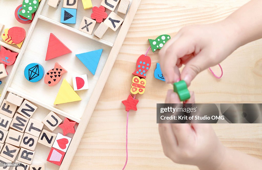 Wooden bead toy