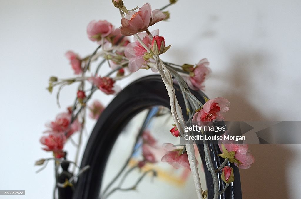 Mirror and flower garland