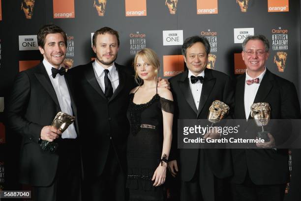 Actors Jake Gyllenhaal, Heath Ledger, Michelle Williams, Director Ang Lee and James Schamus pose backstage at The Orange British Academy Film Awards...