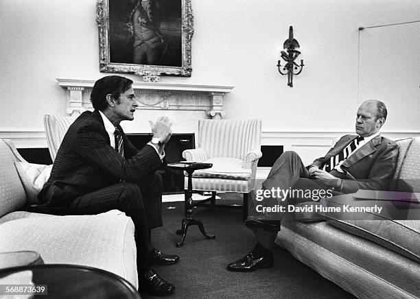 Gerald Ford and George H. W. Bush, chairman of the Republican Party, meet in the Oval Office on the third day of FordÕs presidency August 12, 1974 in...