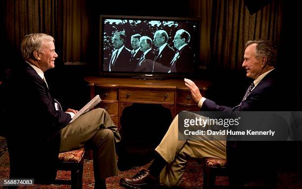 Former President George Bush is interviewed by Tom Brokaw about President Ford in Kennebunkport, Maine, September 7, 2006. On the screen is a...