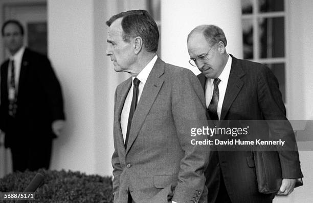President George H.W. Bush, and Sec. Of Defense Dick Cheney in the Rose Garden at the White House talk about the visit of Cheney and Gen. Colin...