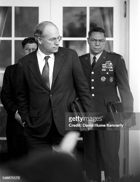 Secretary of Defense Dick Cheney, Chairman of the Joint Chiefs Colin Powell in the Rose Garden at the White House talk about the visit of Cheney and...