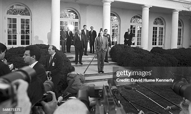 President George H.W. Bush in the Rose Garden at the White House talk about the visit of Sec. Of Defense Dick Cheney and Gen. Colin Powell who had...