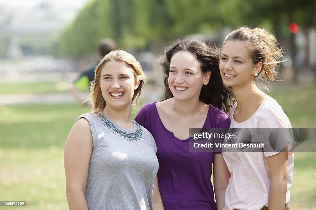 Portrait of three girl in a park