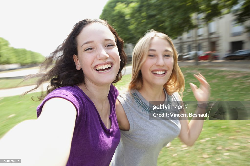 Two teenagers making a selfie