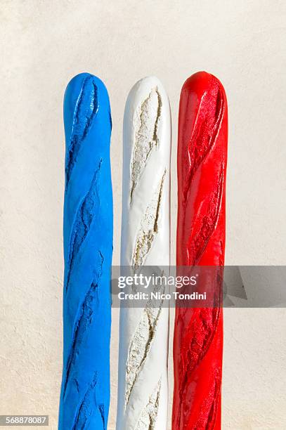 french baguette in the form of a flag - baguette stock pictures, royalty-free photos & images